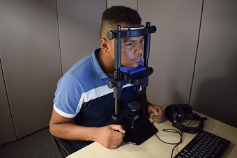 Male using eye equipment