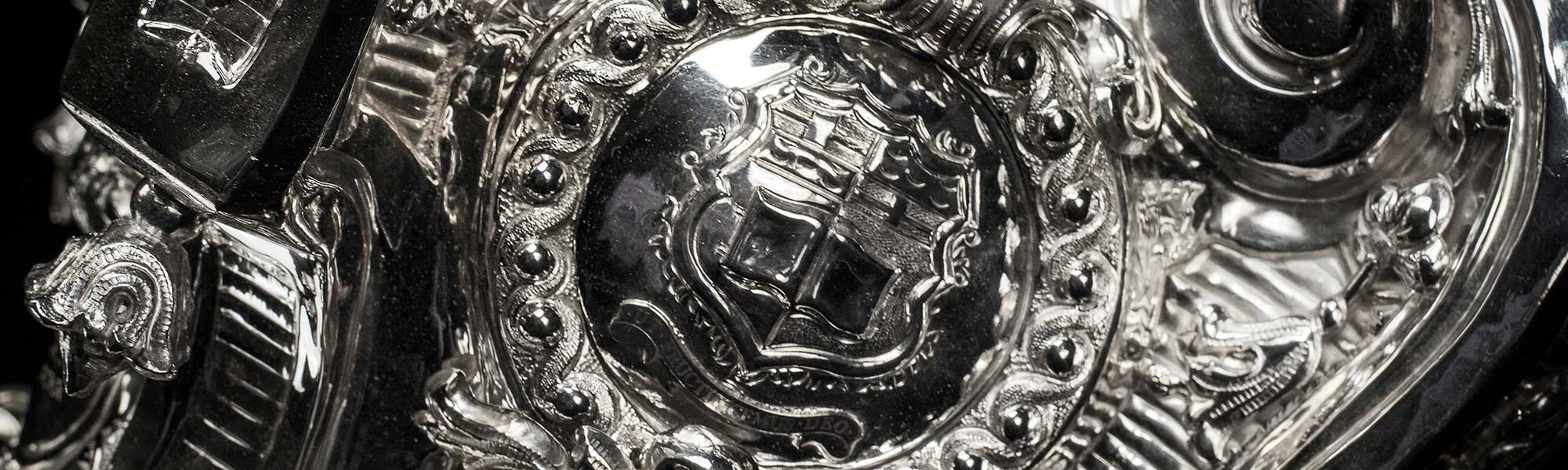 Detail of University of Malta mace in silver
