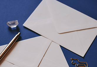 2 envelopes on a blue background