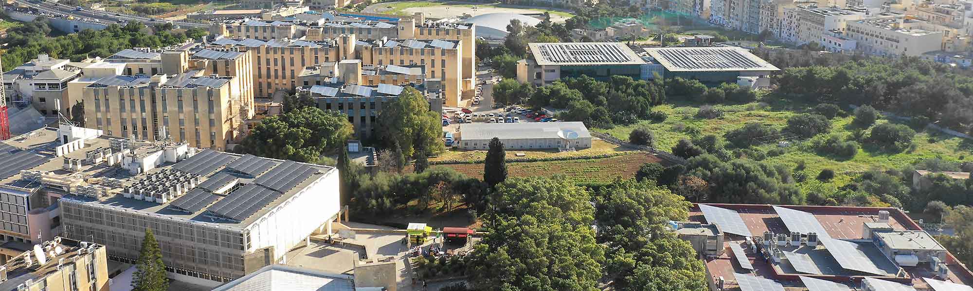 Aerial view of the University Msida campus showing photovoltaic panels on the various buildings