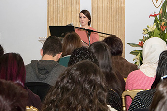 Nurse talking in front of an audience